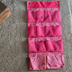 Thirty one wall pocket holder